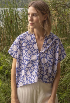 Front view of straight size model wearing Blue & White Floral Double V Cropped Top.