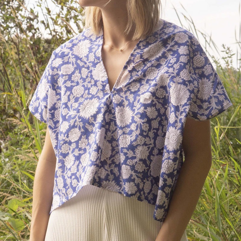 Front view of straight size model wearing Blue & White Floral Double V Cropped Top.