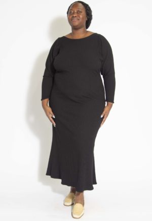Front view of plus size model wearing Black Rib Everything Dress.