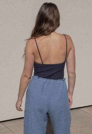 Back view of straight size model wearing Denim Linen Drawstring Wide-Leg Pants.