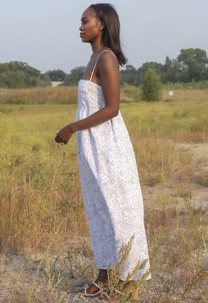 Side view of straight size model wearing White & Blue Floral Straightaway Midi Dress.