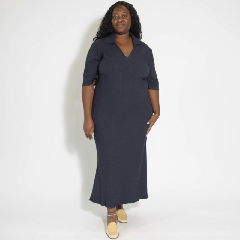 Front view of plus size model wearing Navy Rib V-Neck Collar Rib Midi Dress.