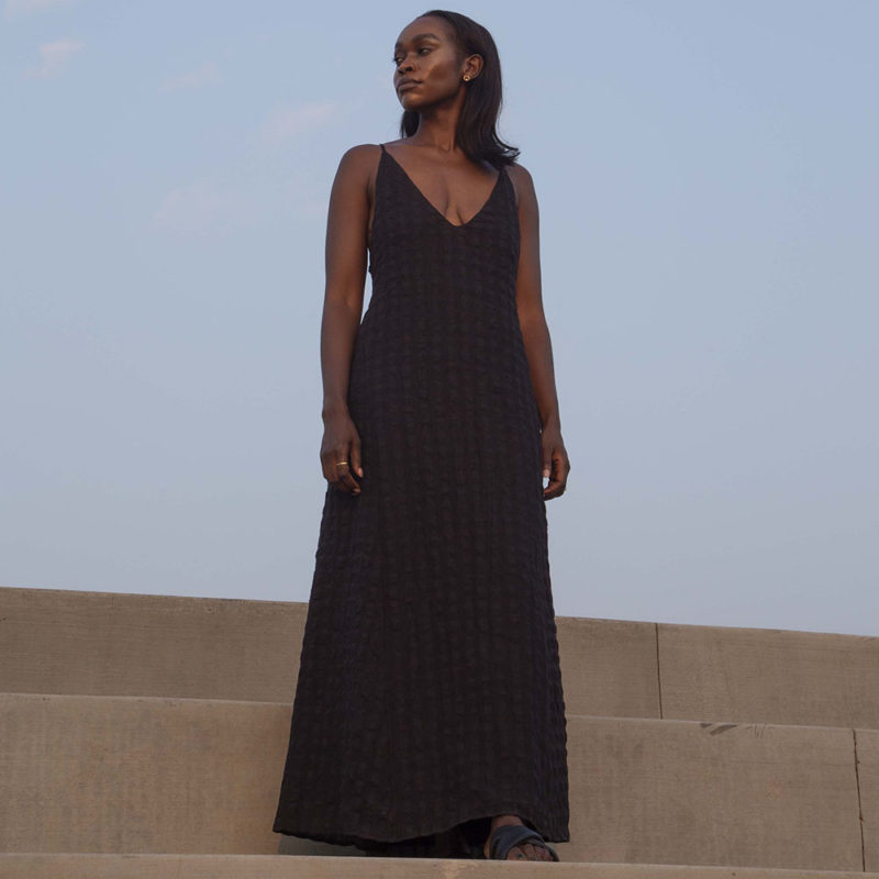 Front view of straight size model wearing Black Check V-Neck Maxi Slip Dress.