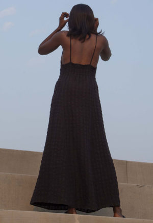 Back view of straight size model wearing Black Check V-Neck Maxi Slip Dress.