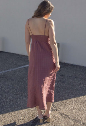 Back view of straight size model wearing Blush Check V-Neck Maxi Slip Dress.