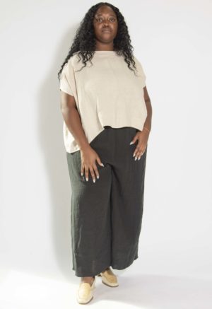 Front view of plus size model wearing Oatmeal Linen Cropped Scoop Neck Top.