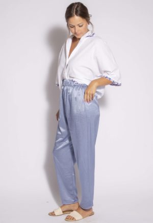 Front/side view of straight size model wearing White Seersucker Cropped Dolman Sleeve Button-Up.