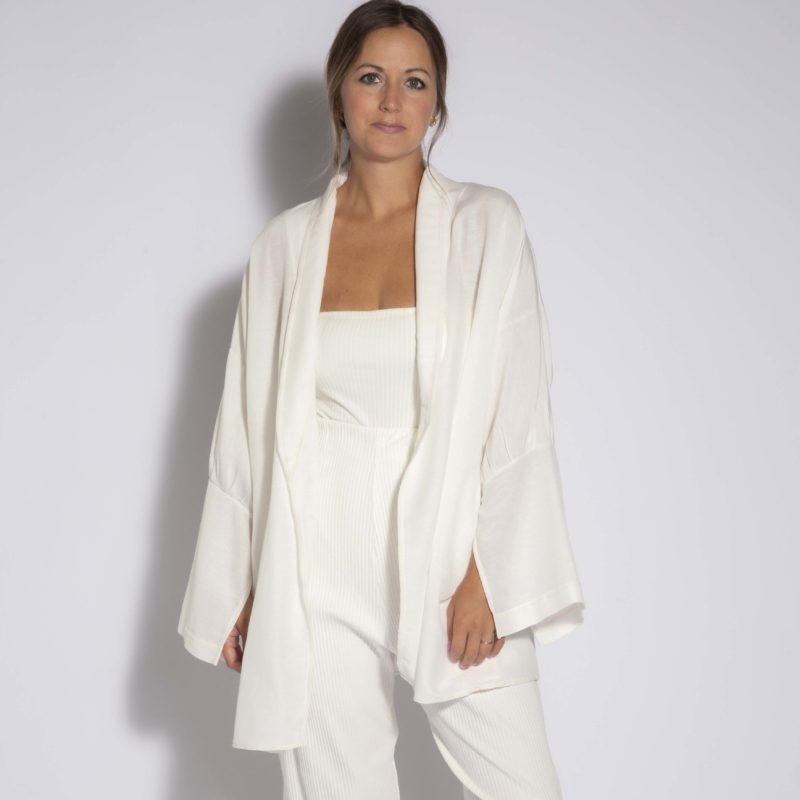 Front view of straight size model wearing Ivory Open Shawl Collar Jacket.