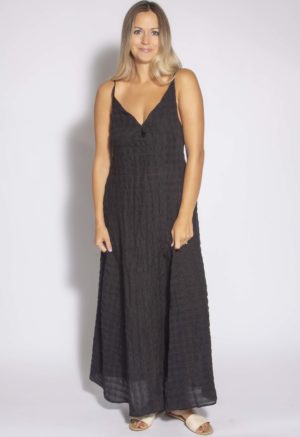 Front view of straight size model wearing Black Check Spaghetti Strap Maxi Dress.