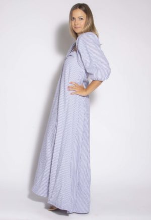 Side view of straight size model wearing Stripe Keyhole Maxi Dress.