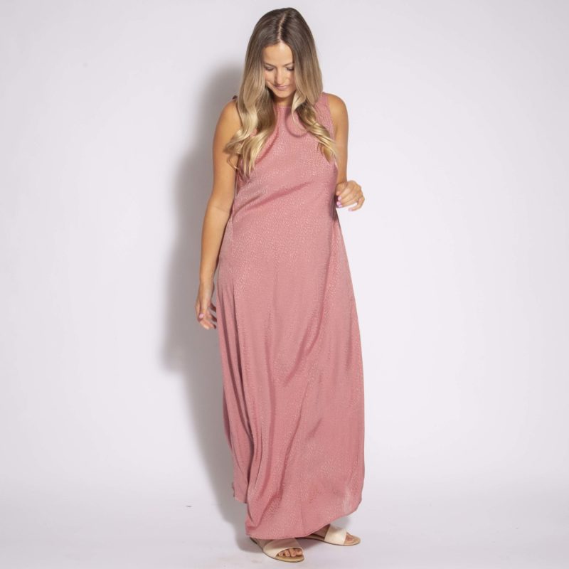 Front view of straight size model wearing Shiny Pink Leaves V-Back Maxi Dress.
