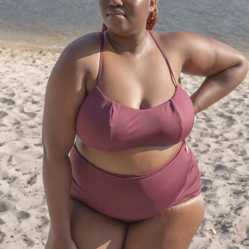 Front view of plus size model wearing Fig Ruched Top.