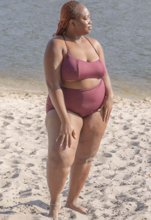 Front view of plus size model wearing Fig Ruched Top.