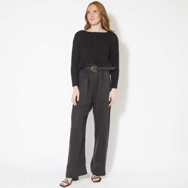 Front view of straight size model wearing Black Lyocell Paper Bag Trousers.