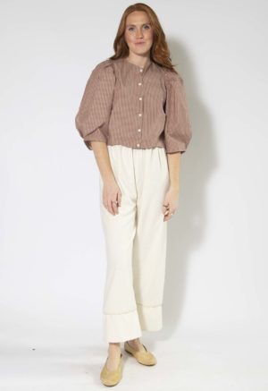 Front view of straight size model wearing Burgundy and Tan Stripe Puff Sleeve Cropped Top.