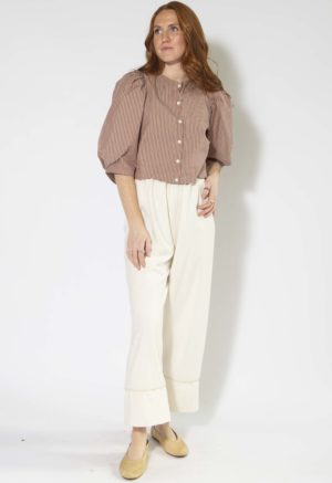 Front view of straight size model wearing Burgundy and Tan Stripe Puff Sleeve Cropped Top.