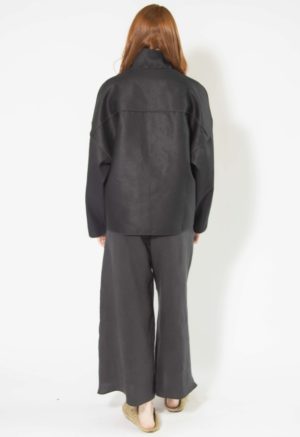 BAck view of straight size model wearing Black Hemp Round Collar Jacket.