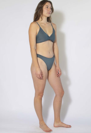 Front/side view of straight size model wearing Storm High Rise Bikini Bottoms.