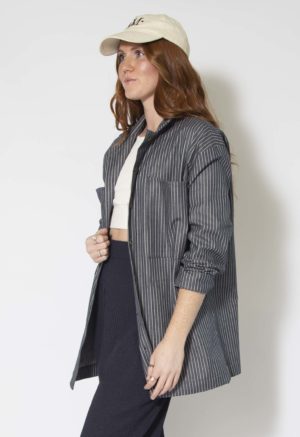 Side view of straight size model wearing Stripe Denim Work Jacket.