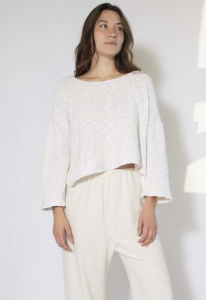 Front view of straight size model wearing White Slub Knit Sweater.