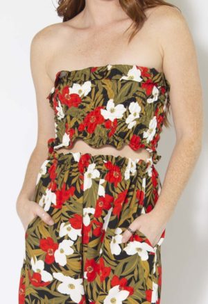 Close-up front view of straight size model wearing Island Floral Paper Bag Trousers.