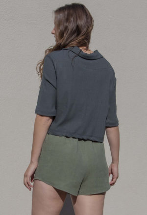 Back view of straight size model wearing Moss Linen Short Shorts.