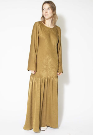 Front view of straight size model wearing Gold Dust Drop Waist Maxi Dress.