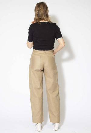 Back view of straight size model wearing Nomad Hemp Tailored Barrel Leg Trouser.