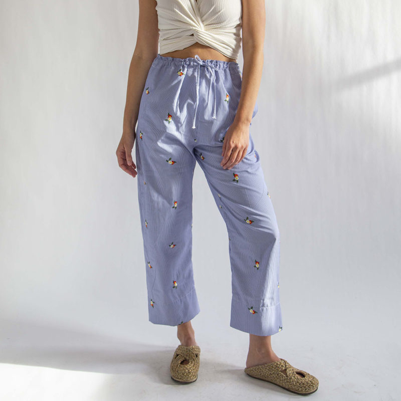 Front view of straight size model wearing Embroidered Blue Stripe Limited Run Drawstring Wide-Leg Pant.