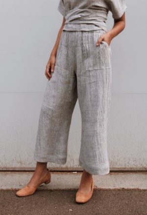 Front/side view of straight size model wearing Light Gray Easy Wide-Leg Pant.