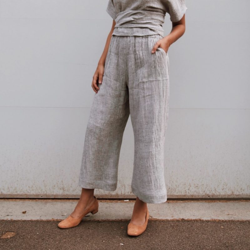 Front/side view of straight size model wearing Light Gray Easy Wide-Leg Pant.