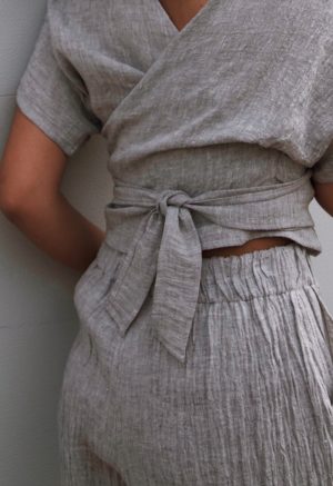 Close-up back view of straight size model wearing Light Gray Easy Wide-Leg Pant.