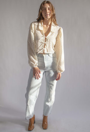 Front view of straight size model wearing Cream Eyelet Limited Edition Beverly Top.