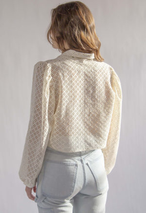 Back view of straight size model wearing Cream Eyelet Limited Edition Beverly Top.