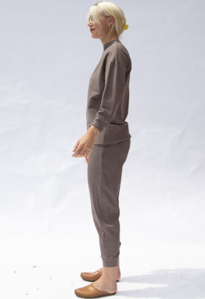 Side view of straight size model wearing Mauve Rib Jogger Pant.