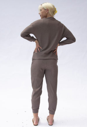 Back view of straight size model wearing Mauve Rib Jogger Pant.