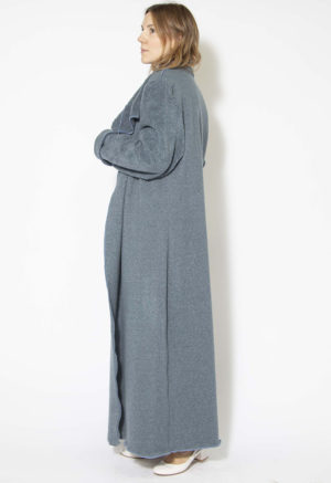Side/back view of straight model wearing Hazy Blue Reversible Lapel Coat.