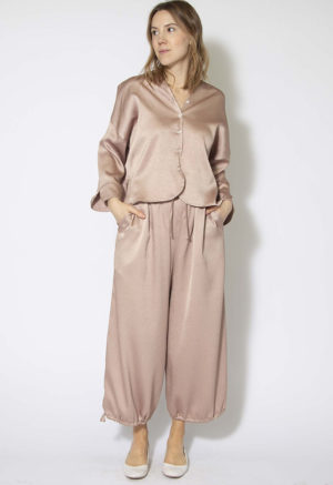 Front view of straight size model wearing Shiny Pale Pink Drawstring Waist/Hem Pant.