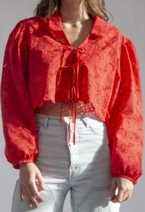 Front view of straight size model wearing Red Eyelet Limited Edition Ramona Top.