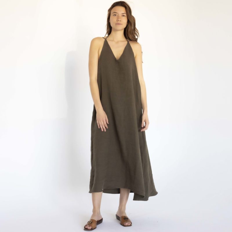 woman in dark green linen v-neck maxi swing dress