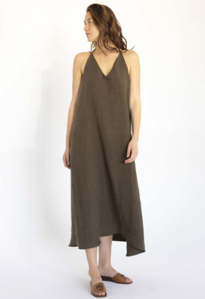 woman in dark green linen v-neck maxi swing dress