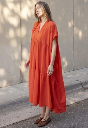 woman in bright red v-neck short sleeve tiered maxi dress