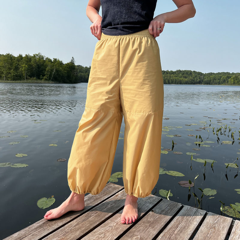 woman in tan/yellow wide-leg pant with balloon cuff