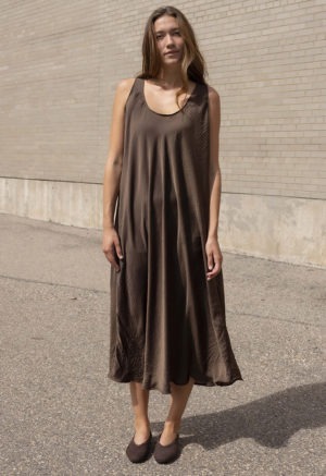 woman in brown scoop midi length tank dress