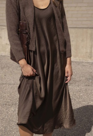 woman in brown scoop midi length tank dress