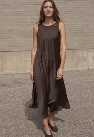 woman in brown scoop midi length tank dress