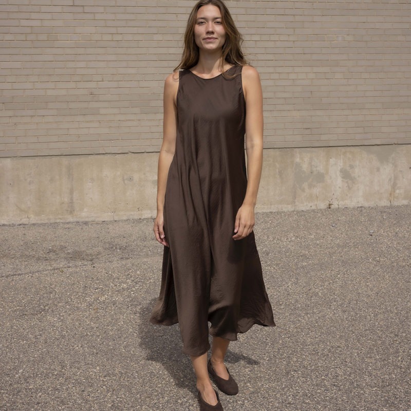 woman in brown scoop midi length tank dress