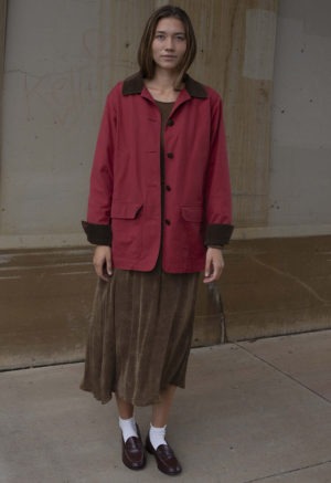 woman in light brown rib scoop long sleeve midi dress
