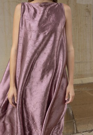 woman in shimmery boatneck tank dress