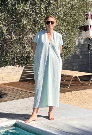 woman in green and white stripe kaftan